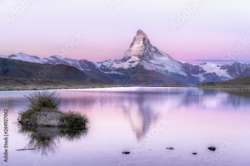 Exciting morning view of Stellisee lake with Matterhorn/Cervino peak on background. Unbelievable autumn scene of Swiss Alps, Zermatt location, Switzerland, Europe. Beauty of nature concept background.