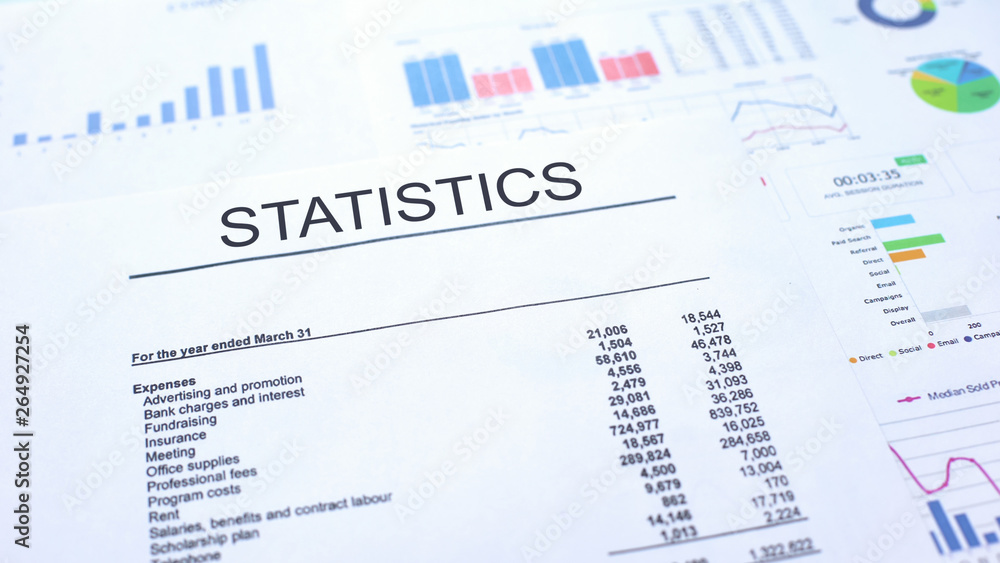 Statistics official document lying on table, graphs charts and diagrams, text Statistics official document lying on table, graphs charts and diagrams, text