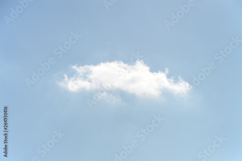 One cloud isolated on blue sky background