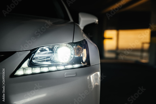 Xenon and LED headlamp of a modern car 