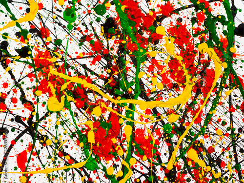 splashes on red and black and green and yellow paint