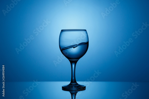 Splash of clear water in a glass