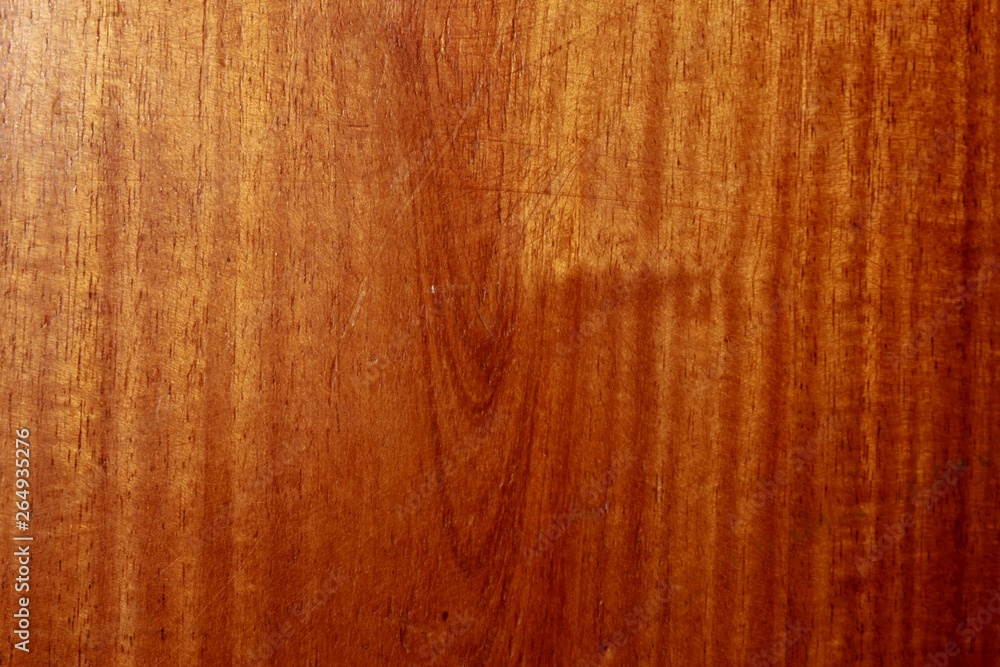 Naklejka premium Wood brown grain texture, top view of polished wooden table