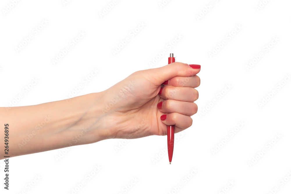 Female hand holding a pen on white background. Female hand holding a pen on white background.