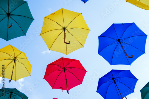 abstract background. Colorful umbrellas in the sky. Street decoration.