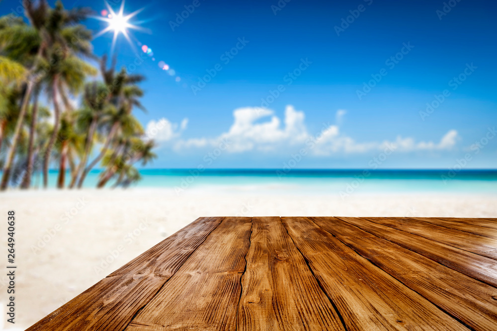 Summer table background of free space for your decoration and landscape of beach with palms. Summer table background of free space for your decoration and landscape of beach with palms.