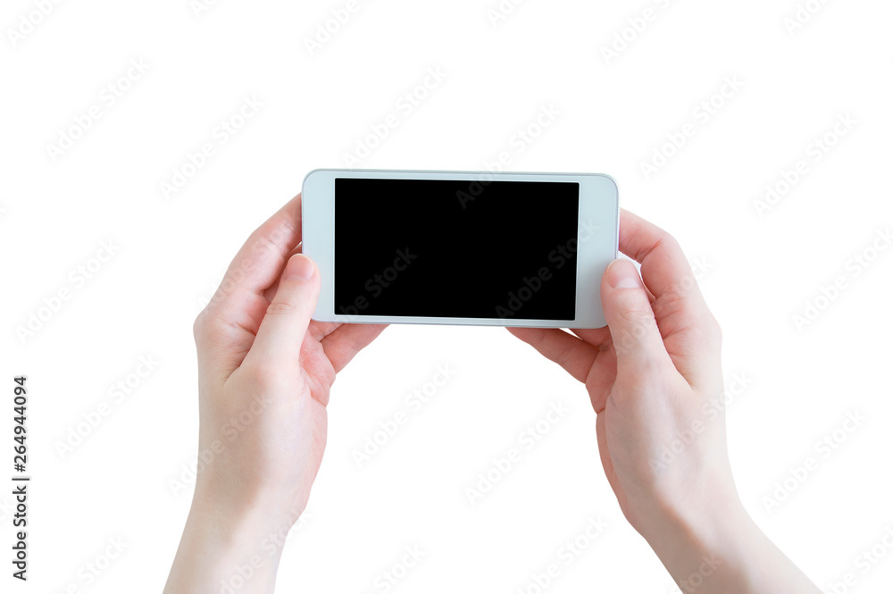 White smartphone with a black display in the hands of a Caucasian girl. Close-up. White smartphone with a black display in the hands of a Caucasian girl. Close-up.
