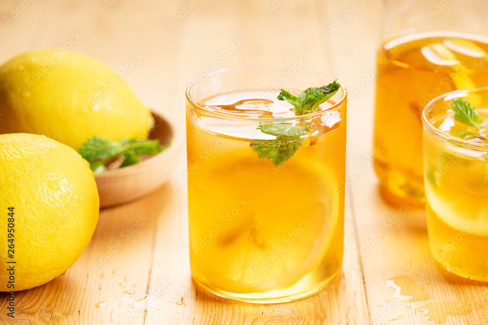 iced tea with lemon slices and fresh mint leaves iced tea with lemon slices and fresh mint leaves
