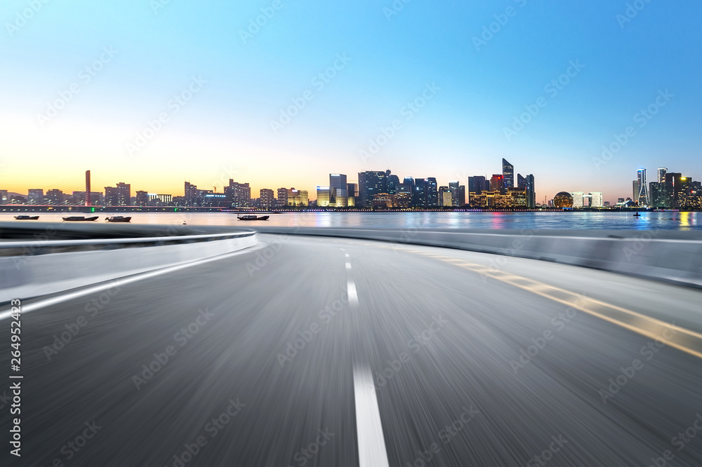Empty road floor surface with modern city landmark buildings of hangzhou bund Skyline,zhejiang,china Empty road floor surface with modern city landmark buildings of hangzhou bund Skyline,zhejiang,china