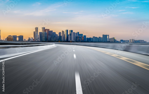 Empty road floor surface with modern city landmark buildings of hangzhou bund Skyline zhejiang china