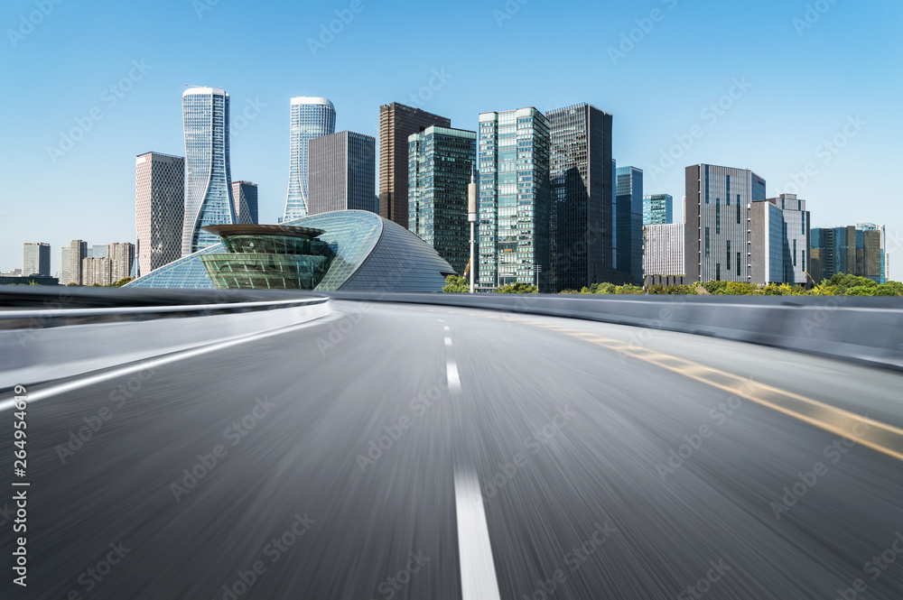Empty road floor surface with modern city landmark buildings of hangzhou bund Skyline,zhejiang,china Empty road floor surface with modern city landmark buildings of hangzhou bund Skyline,zhejiang,china