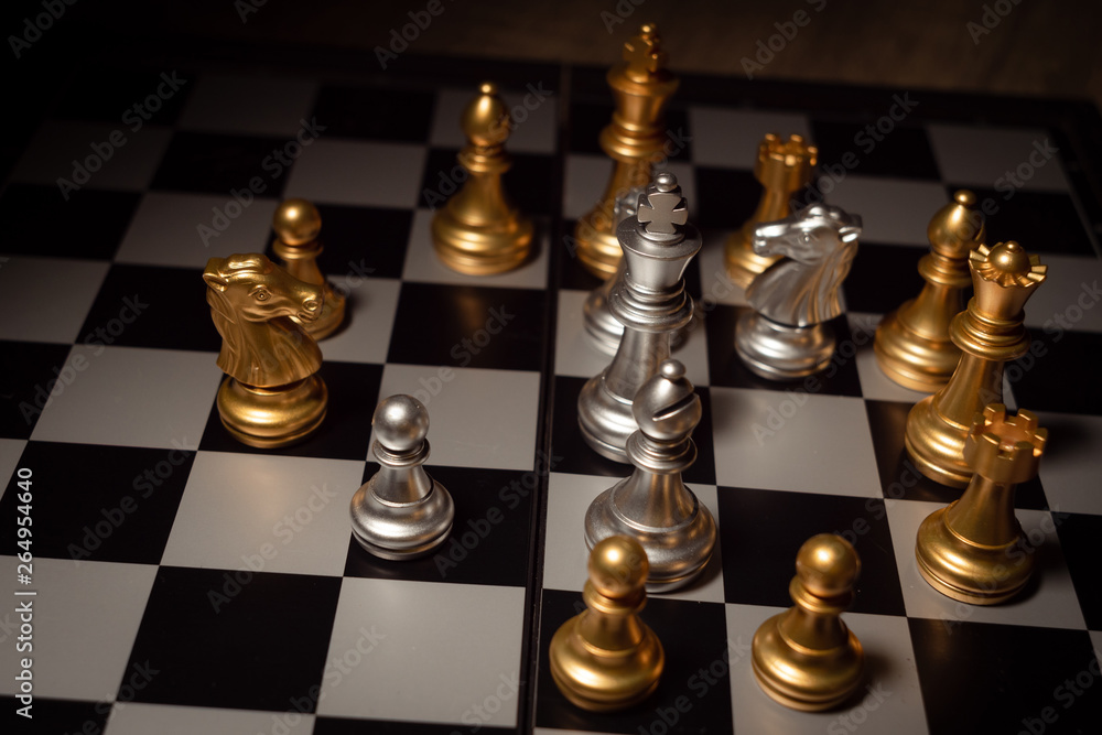 Close up shot chess on the board game with dark mood and tone process competition concept Close up shot chess on the board game with dark mood and tone process competition concept