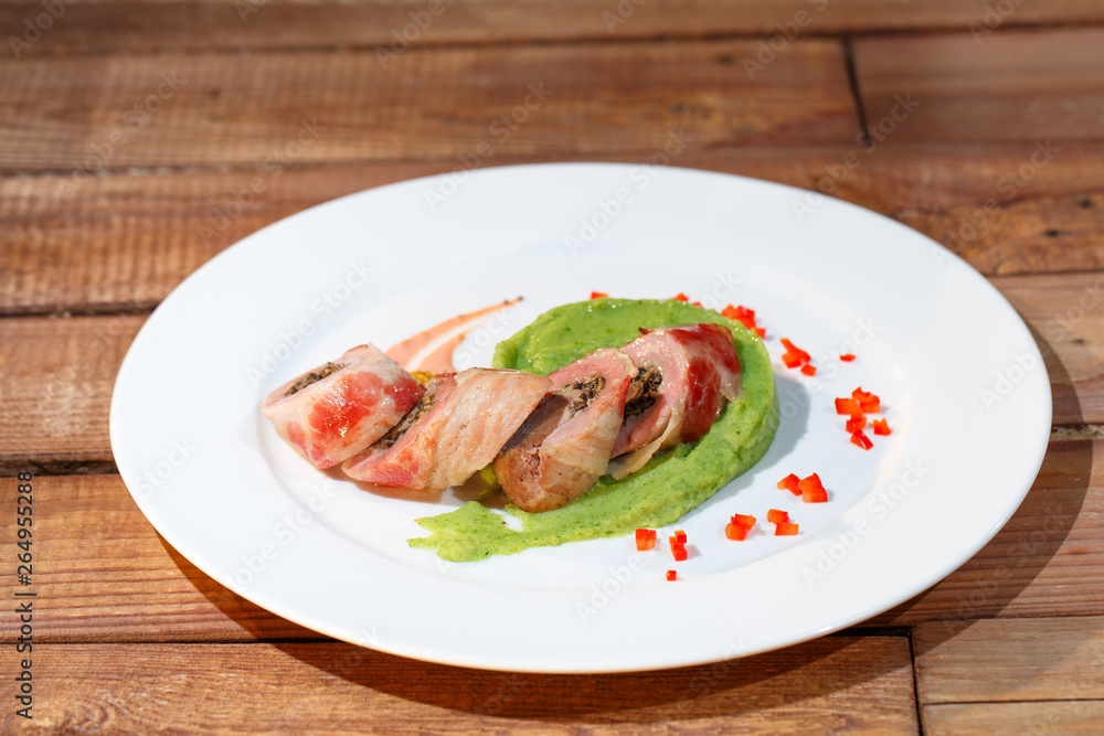 Pork tenderloin with broccoli puree. Pork tenderloin with broccoli puree.