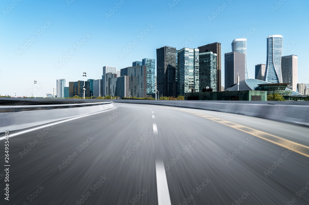 Empty road floor surface with modern city landmark buildings of hangzhou bund Skyline,zhejiang,china Empty road floor surface with modern city landmark buildings of hangzhou bund Skyline,zhejiang,china