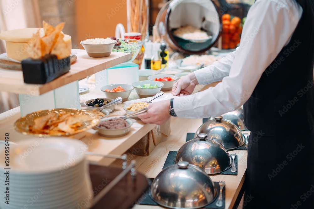 Breakfast buffet at the hotel or restaurant. Breakfast buffet at the hotel or restaurant.