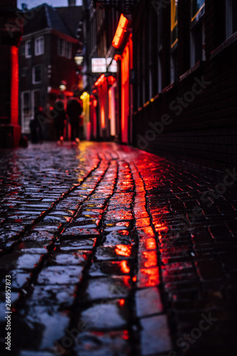 Tableau sur toile Red ligths of a famous red light distict in Amsterdam, Netherlands