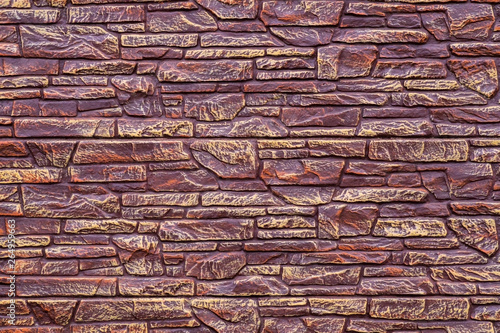The texture of the stones covered with brown lacquer, can be used as a background