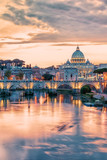 The city of Rome at sunset with the view on the Vatican