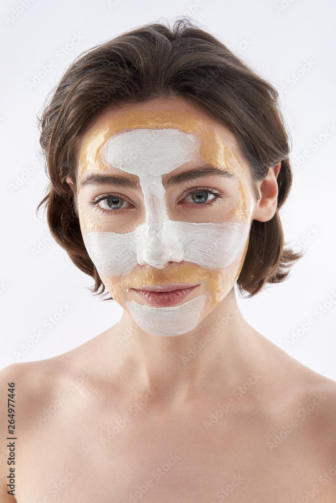 Pretty smiling brunette woman with face mask Pretty smiling brunette woman with face mask