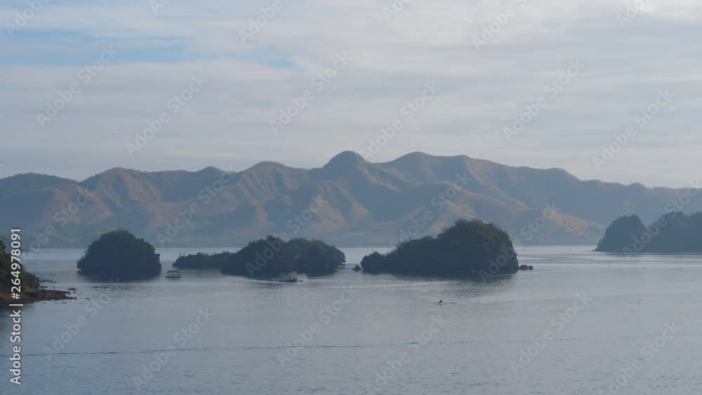 Passing by tropical islands in Coron, Philippines Passing by tropical islands in Coron, Philippines