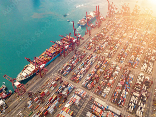 Canvas Print Aerial top view of container cargo ship in the export and import business and logistics international goods in urban city