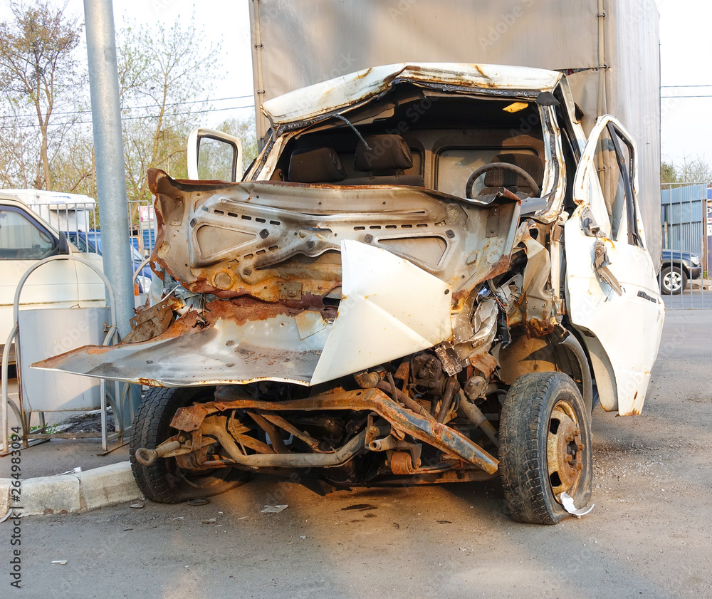 Cargo van broken in a road accident. Russia. Frontal collision