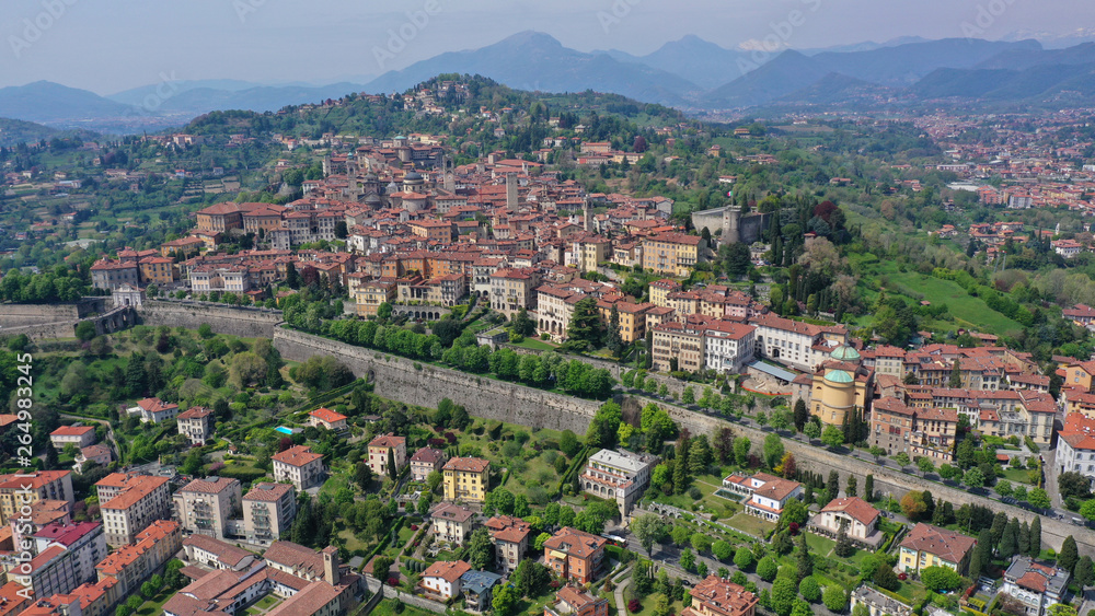 Aerial drone photo of iconic and beautiful old fortified upper Medieval city of Bergamo, Lombardy, Italy