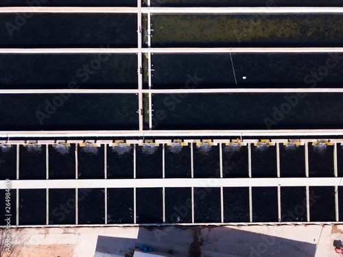 Top view of opened pools in trout fish farm photo