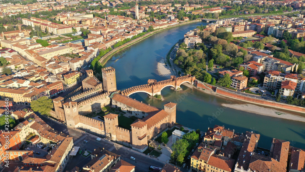 Aerial drone photo from iconic fortified medieval castle and bridge of Castelvecchio used as a museum, Verona, Italy
