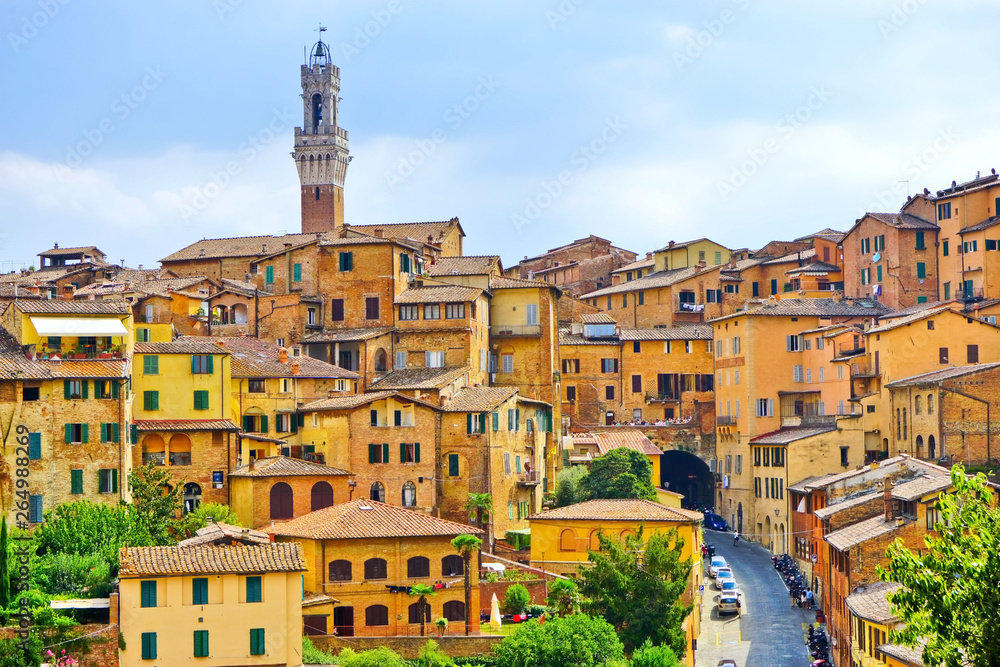 View of the historic cityscape of Siena in Tuscany, Italy.