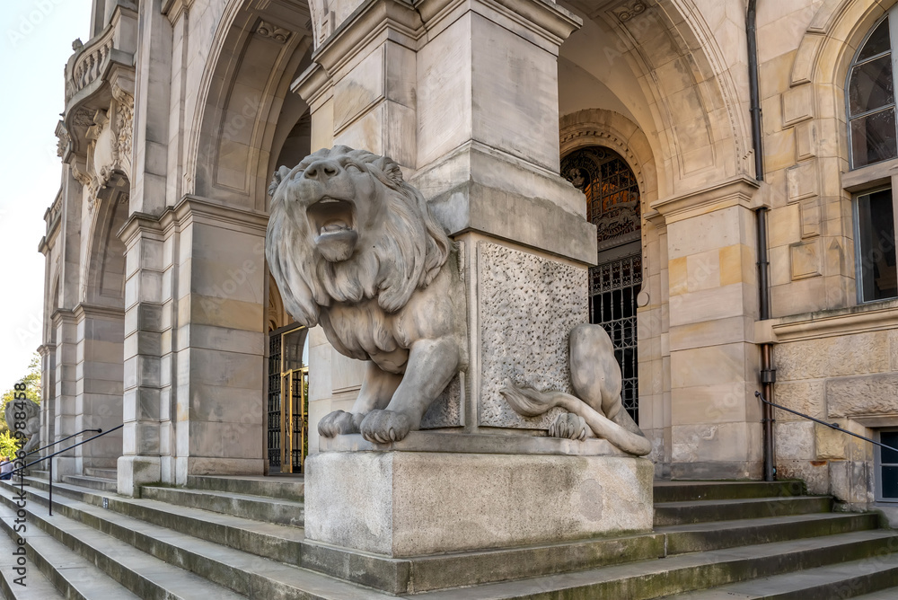 White lion statue located in front of Hall building in Hannover, Germany