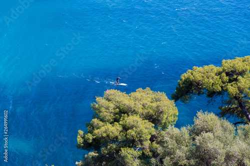parga sea island blue among green pine trees greece