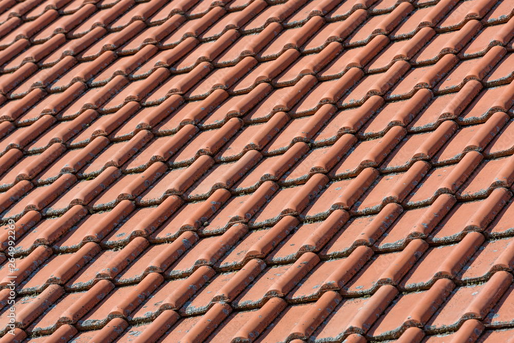 Close up view of red ceramic rooftop, roof cover on housetop