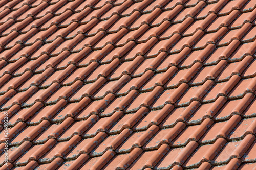Close up view of red ceramic rooftop, roof cover on housetop