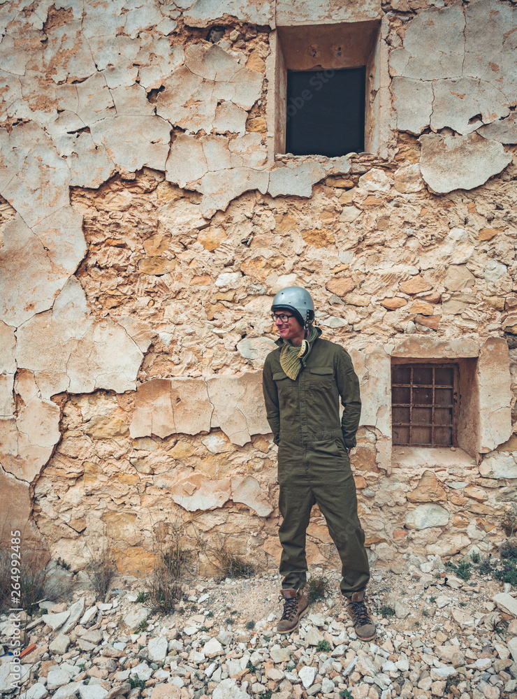 attractive man in the field wearing aviation clothes attractive man in the field wearing aviation clothes