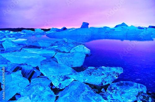 View of Jokulsarlon Glacier Lagoon at the Vatnajokull National Park in Iceland at twilight in winter.