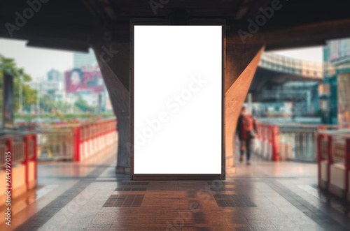 Wallpaper Mural large blank advertise billboard white LED screen vertical on big concrete pole walk way outdoor in city. Torontodigital.ca