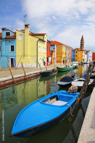 Boats anchored in canal in Burano, Venice, Italy © donyanedomam