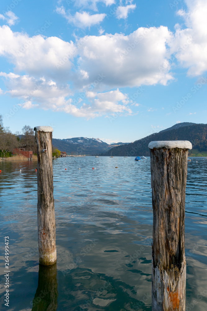 lake and boats in the mountains of Switzerland during evening and sunset lake and boats in the mountains of Switzerland during evening and sunset