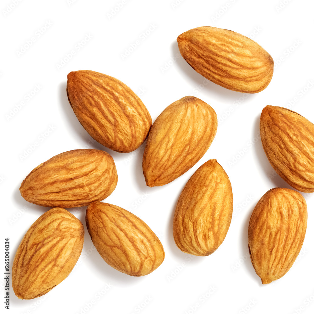 Nuts almonds scattered on a white background. Isolated with shadow. Flat lay. Nuts almonds scattered on a white background. Isolated with shadow. Flat lay.