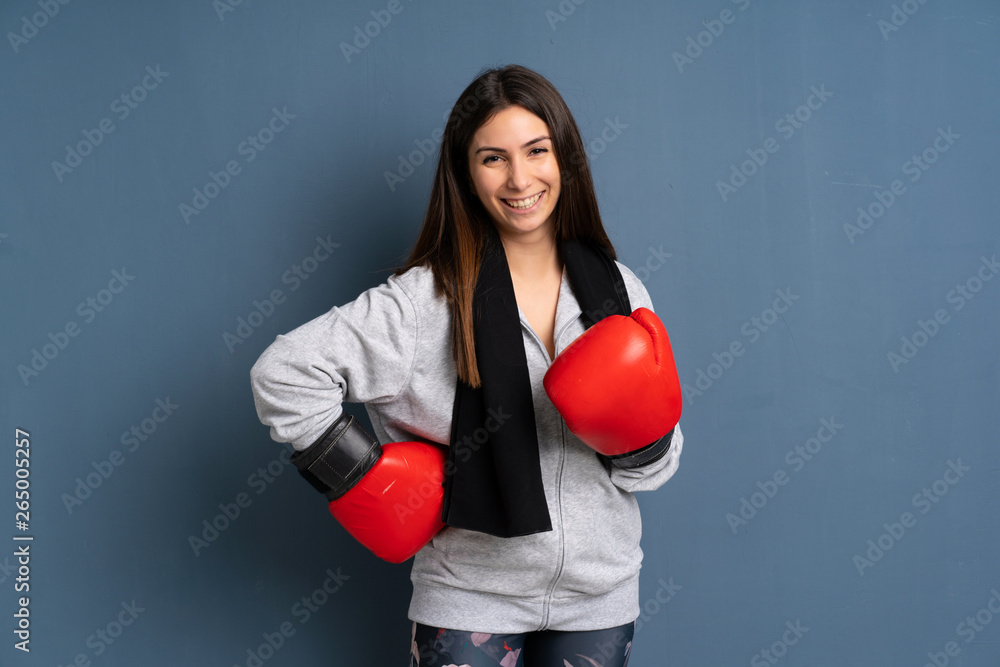 Young sport woman with boxing gloves Young sport woman with boxing gloves