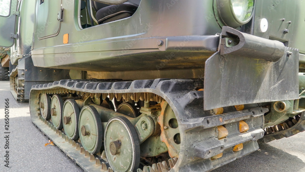 19455_Round_metals_on_the_flat_tires_of_the_military_tanks.jpg 19455_Round_metals_on_the_flat_tires_of_the_military_tanks.jpg