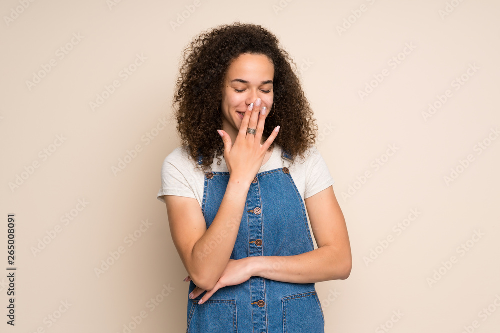 Dominican woman with overalls smiling a lot Dominican woman with overalls smiling a lot