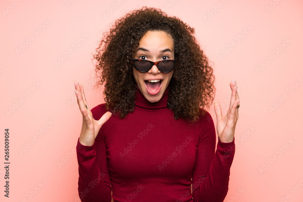 Dominican woman with turtleneck sweater with surprise facial expression Dominican woman with turtleneck sweater with surprise facial expression