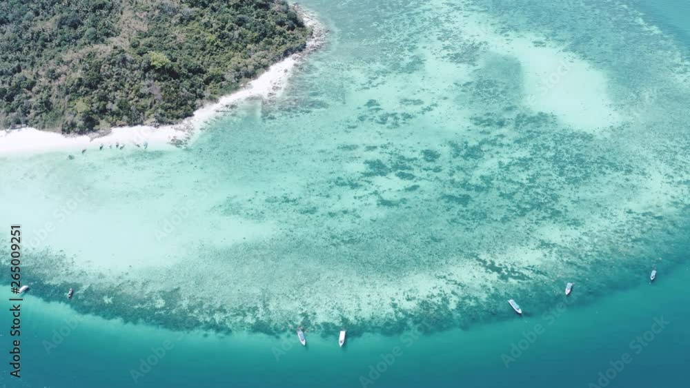 Aerial drone view of beautiful tropical Bamboo Island white beach with boats in Thailand Aerial drone view of beautiful tropical Bamboo Island white beach with boats in Thailand