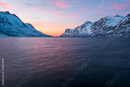 Beautiful and colorful sunset in winter at Ersfjord, Norway