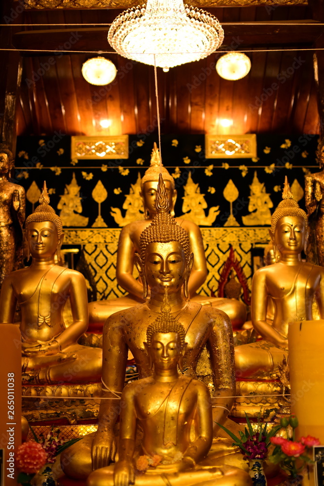 Fototapeta premium Golden Buddha statue at Bangplee Temple, Luang Pho To Temple, Thailand The beauty of temples and Buddha images of Thai religious art