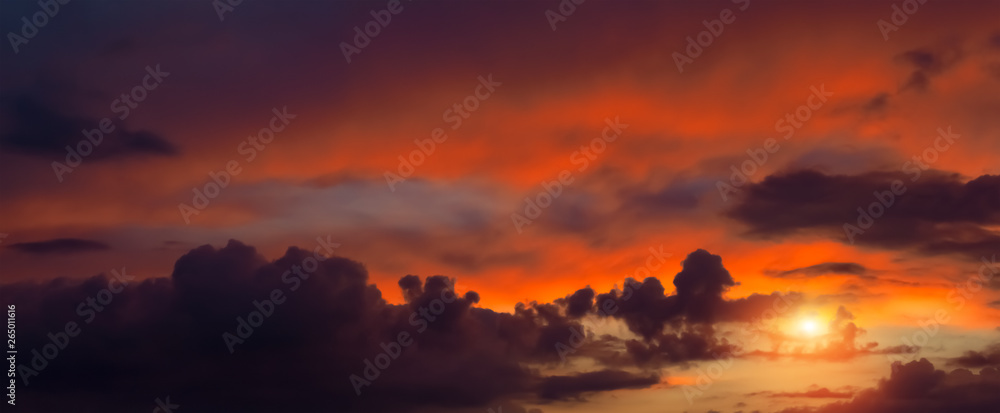 Fototapeta premium panoramic dramatic sunset with orange and yellow sky background