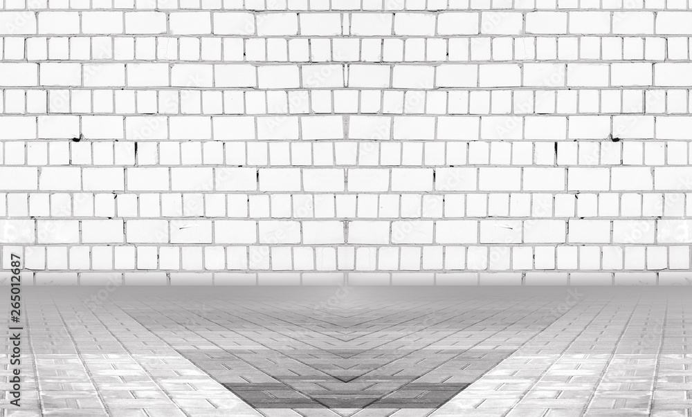 Background of empty gray room with brick wall and concrete floor.