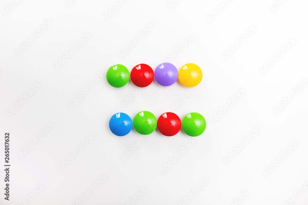 A multicolored mathematical signs made of children's toys A multicolored mathematical signs made of children's toys